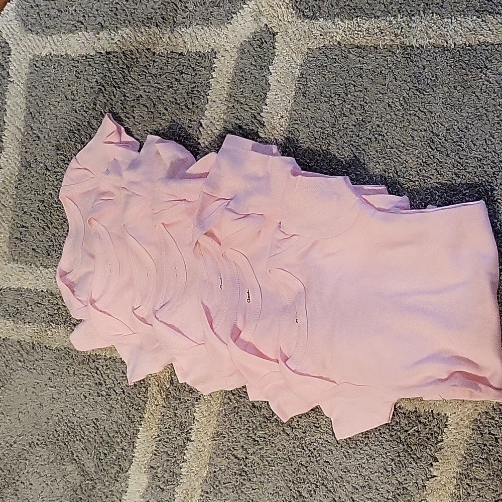 7 Newborn pink onesies